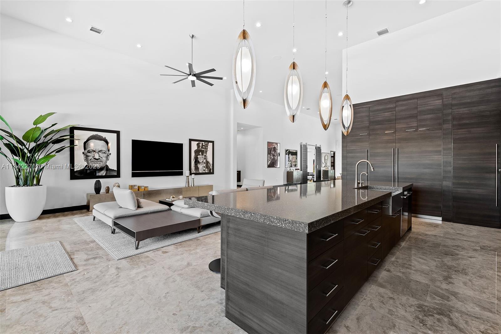 2610 Oak Park Drive Davie, FL 33325 - Photo 8 of 60 a living room with patio furniture and a flat screen tv