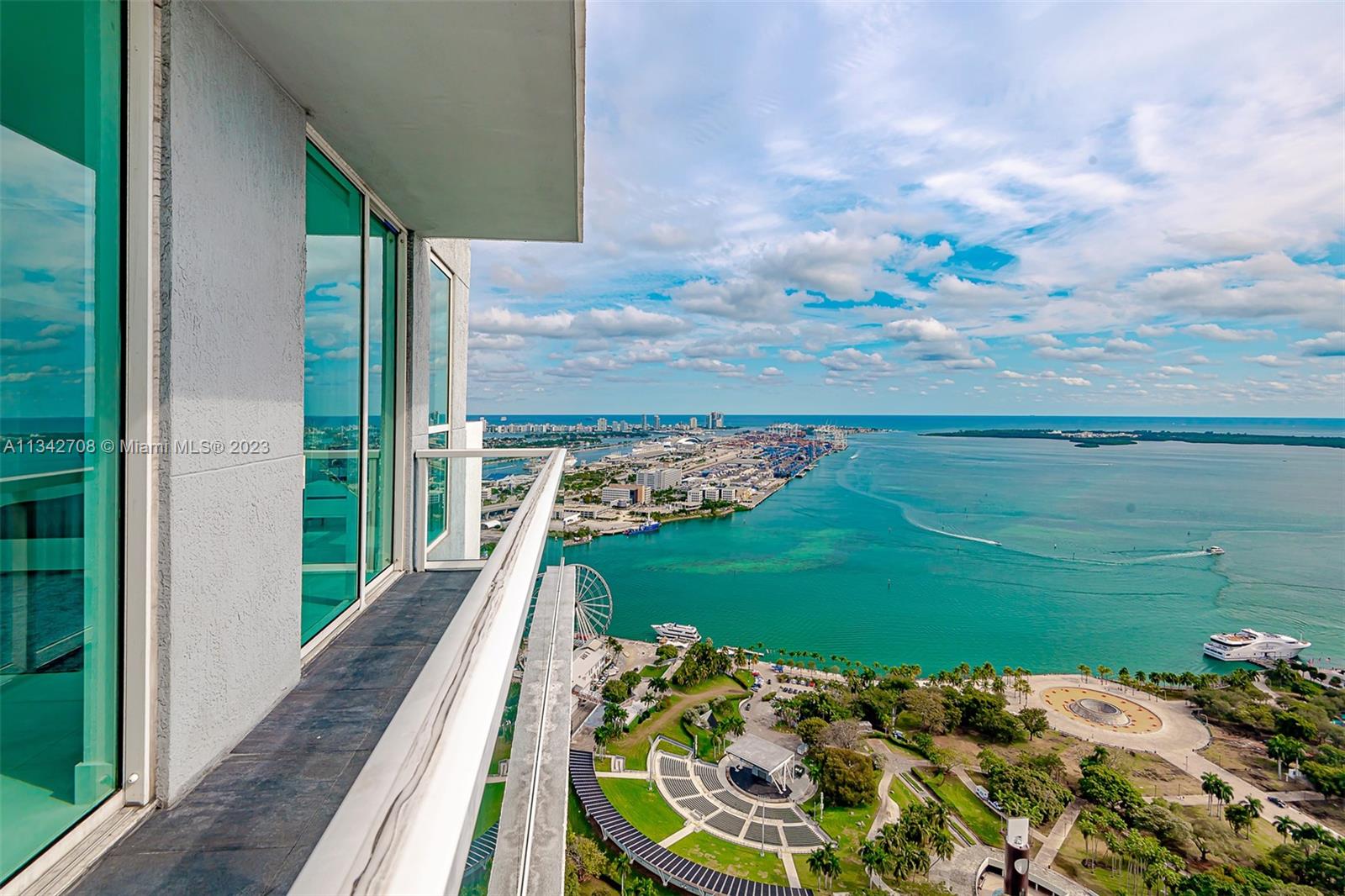 244 Biscayne Boulevard, Unit 4907 Miami, FL 33132 - Photo 1 of 25 a view of a balcony with an ocean