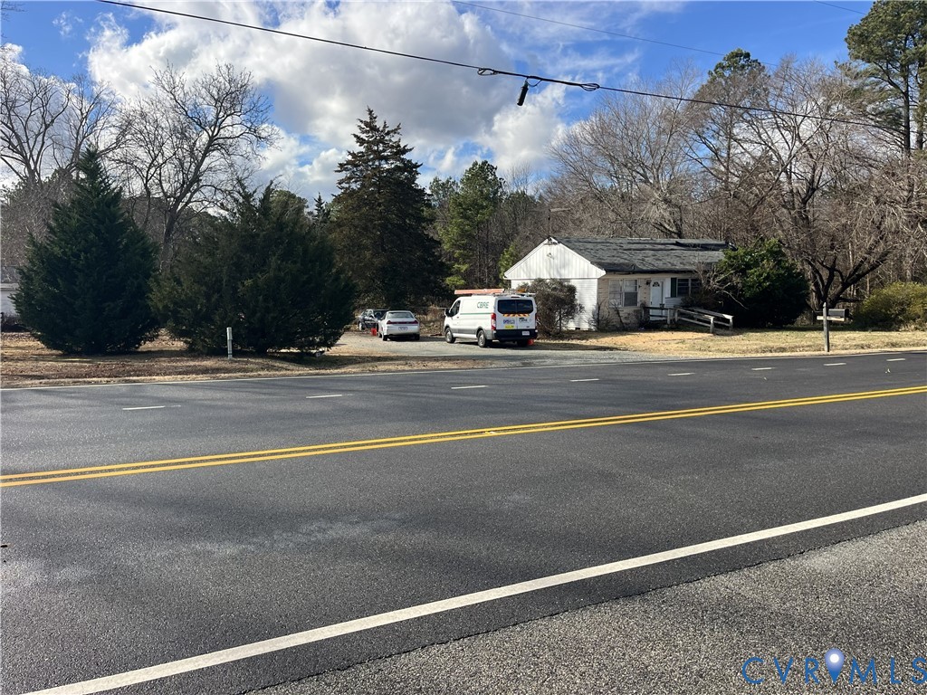 a view of a city street from a house