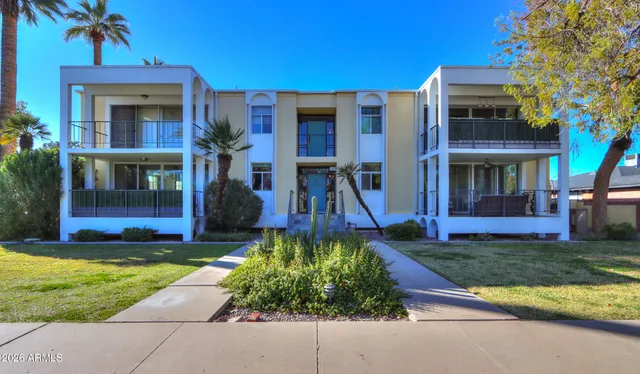 a view of a house with a swimming pool