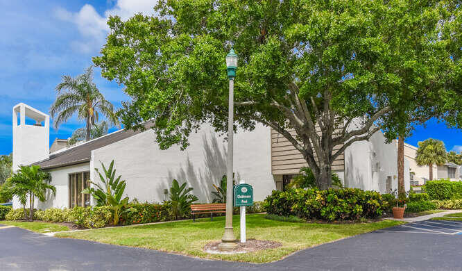 1605 Highway 1, Unit M1101 Jupiter, FL 33477 - Photo 8 of 27 a front view of a house with garden