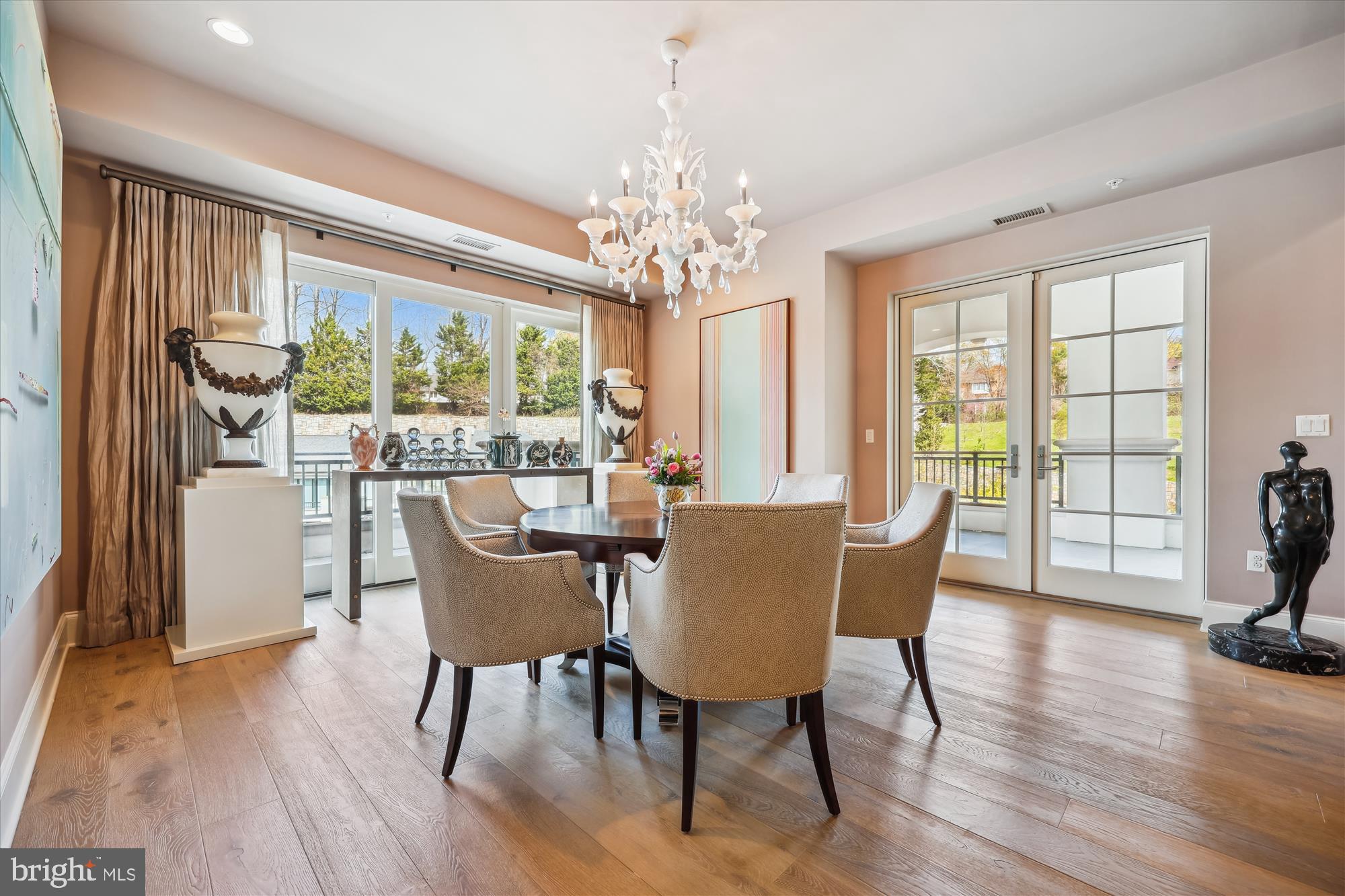 8121 River Road, Unit 451 Bethesda, MD 20817 - Photo 13 of 94 a view of a dining room with furniture window and wooden floor