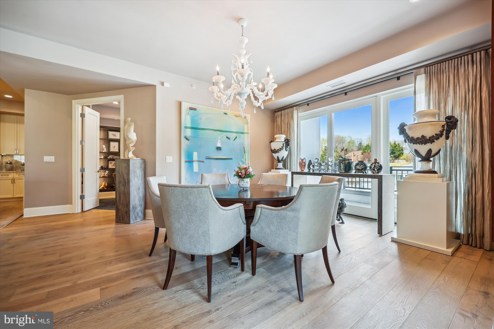 8121 River Road, Unit 451 Bethesda, MD 20817 - Photo 14 of 94 a view of a dining room with furniture window and wooden floor