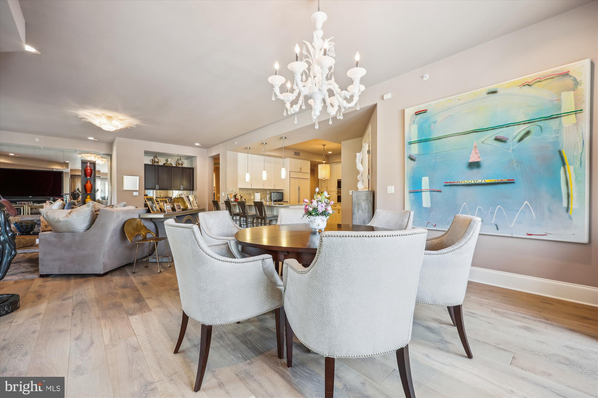 8121 River Road, Unit 451 Bethesda, MD 20817 - Photo 15 of 94 a view of a dining room with furniture a chandelier and wooden floor