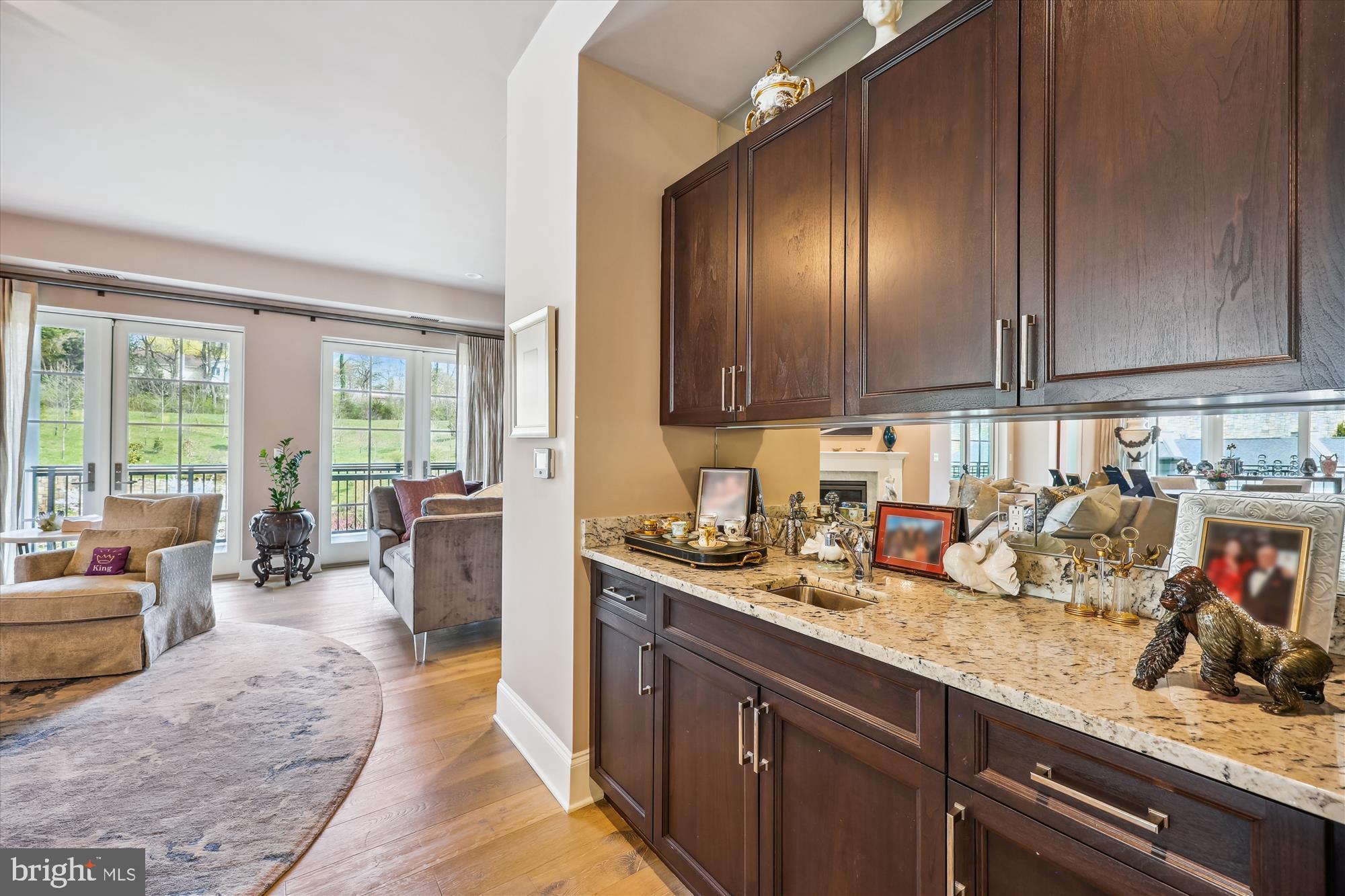 8121 River Road, Unit 451 Bethesda, MD 20817 - Photo 29 of 94 a kitchen with sink refrigerator and cabinets