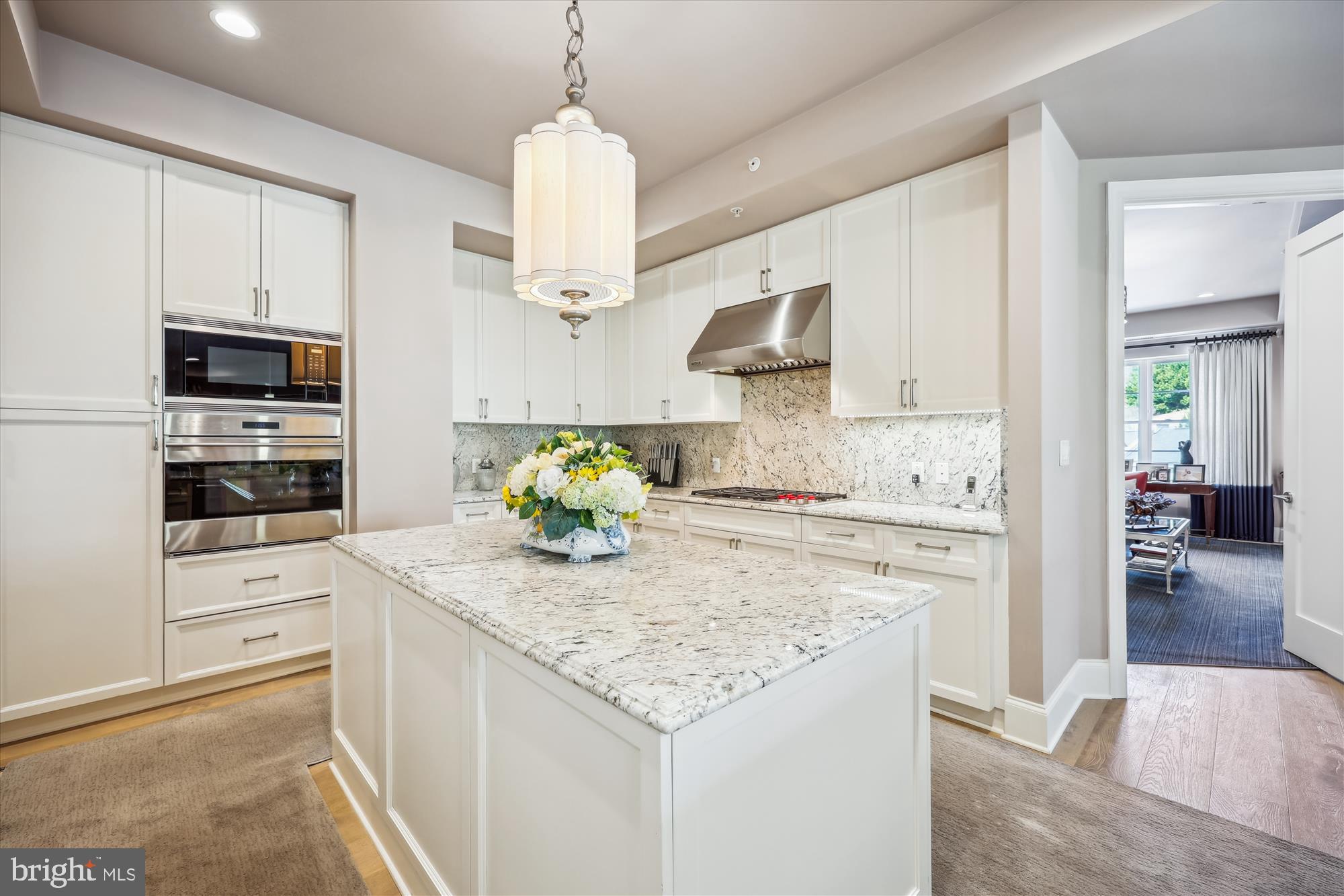 8121 River Road, Unit 451 Bethesda, MD 20817 - Photo 35 of 94 a kitchen with stainless steel appliances granite countertop a sink a stove and cabinets