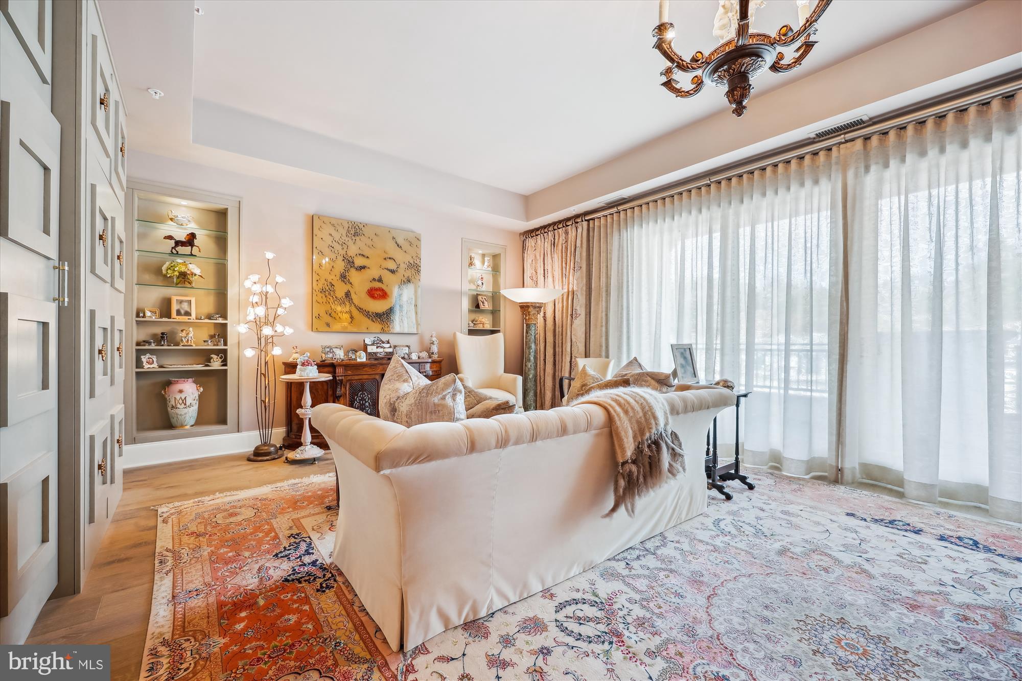 8121 River Road, Unit 451 Bethesda, MD 20817 - Photo 40 of 94 a living room with furniture and a large window