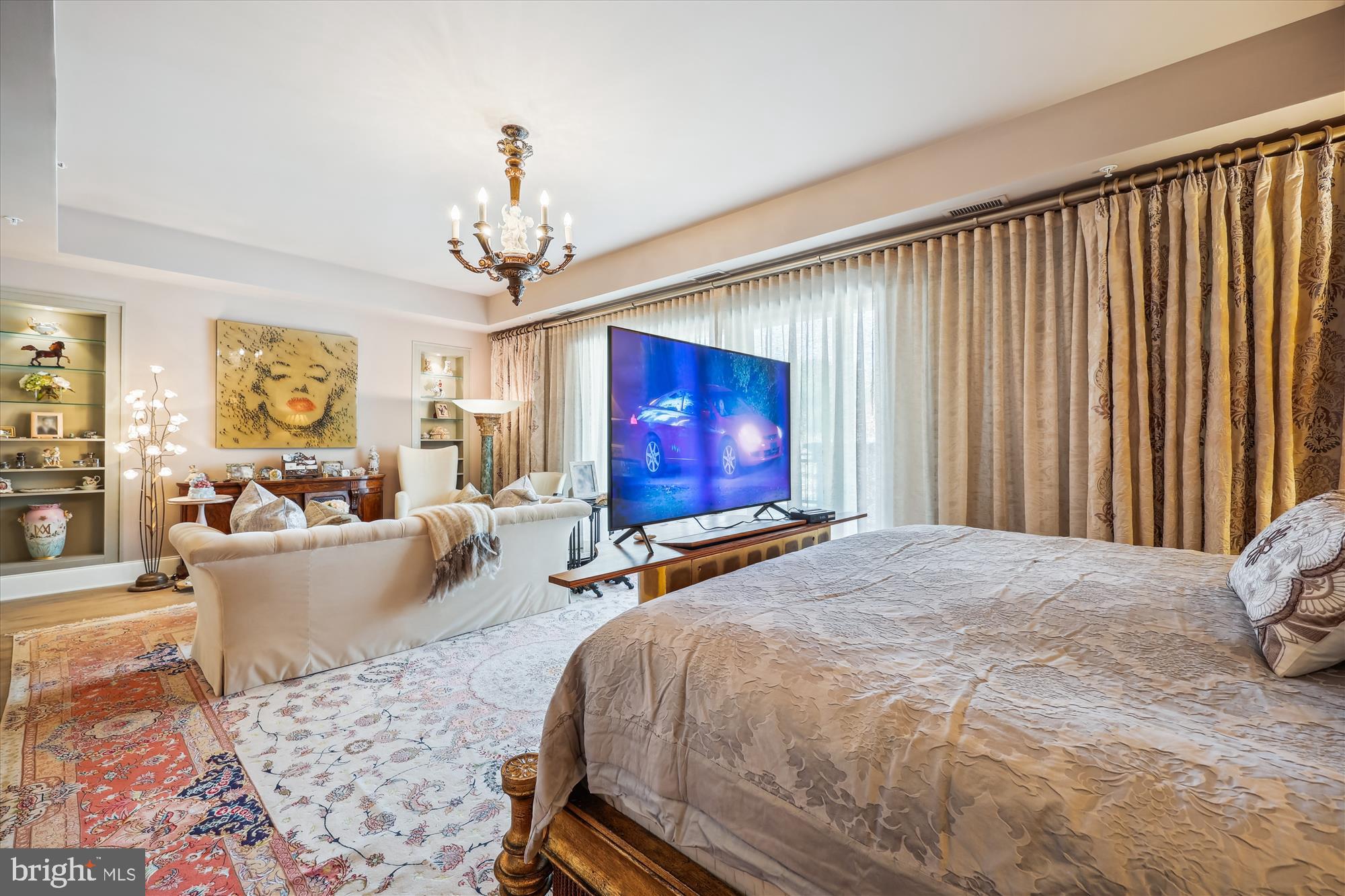 8121 River Road, Unit 451 Bethesda, MD 20817 - Photo 46 of 94 a bed room with a bed and a couch