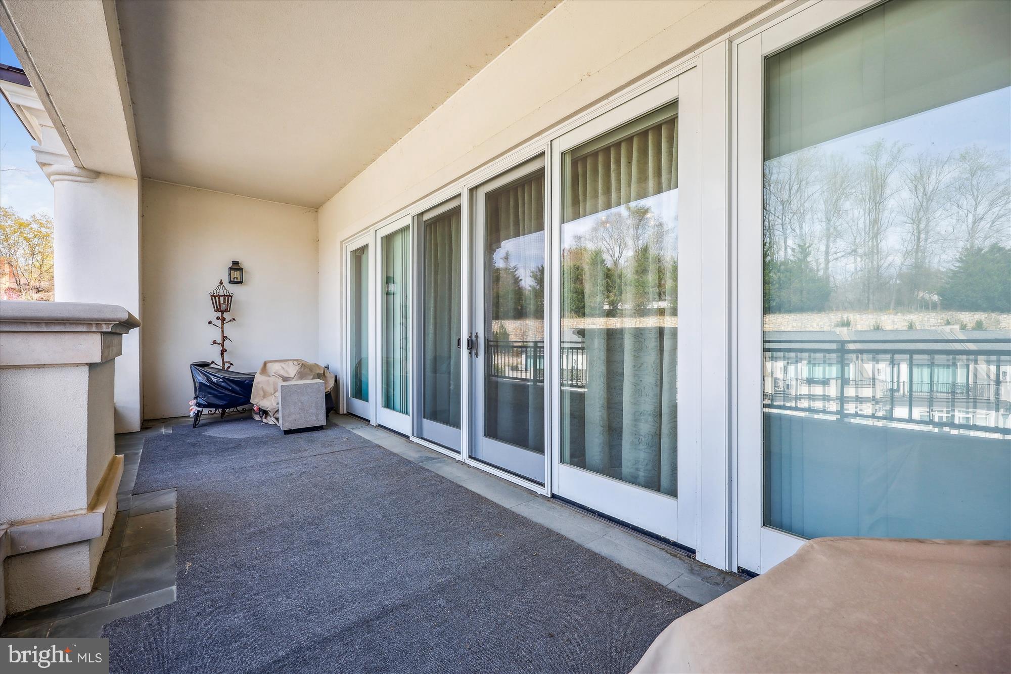 8121 River Road, Unit 451 Bethesda, MD 20817 - Photo 55 of 94 a view of a livingroom with furniture and windows
