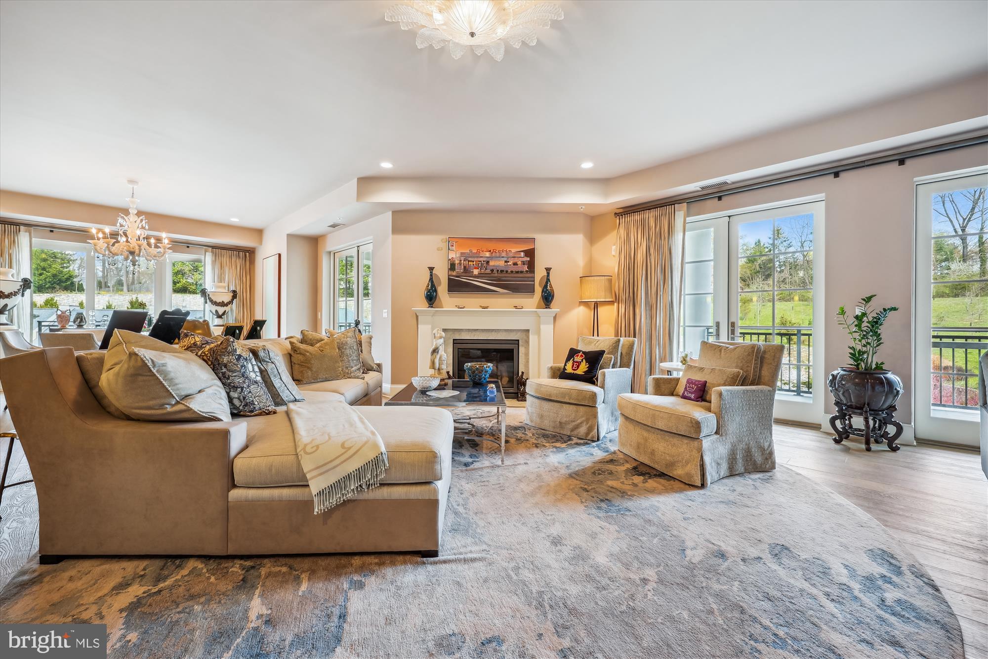 8121 River Road, Unit 451 Bethesda, MD 20817 - Photo 8 of 94 a living room with furniture large window and a fireplace