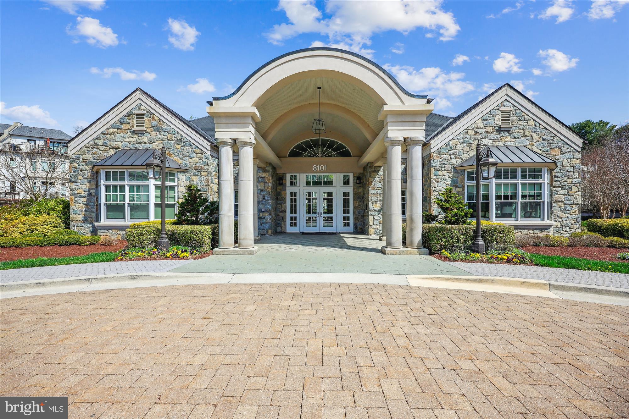 8121 River Road, Unit 451 Bethesda, MD 20817 - Photo 81 of 94 a view of a brick house with a large windows