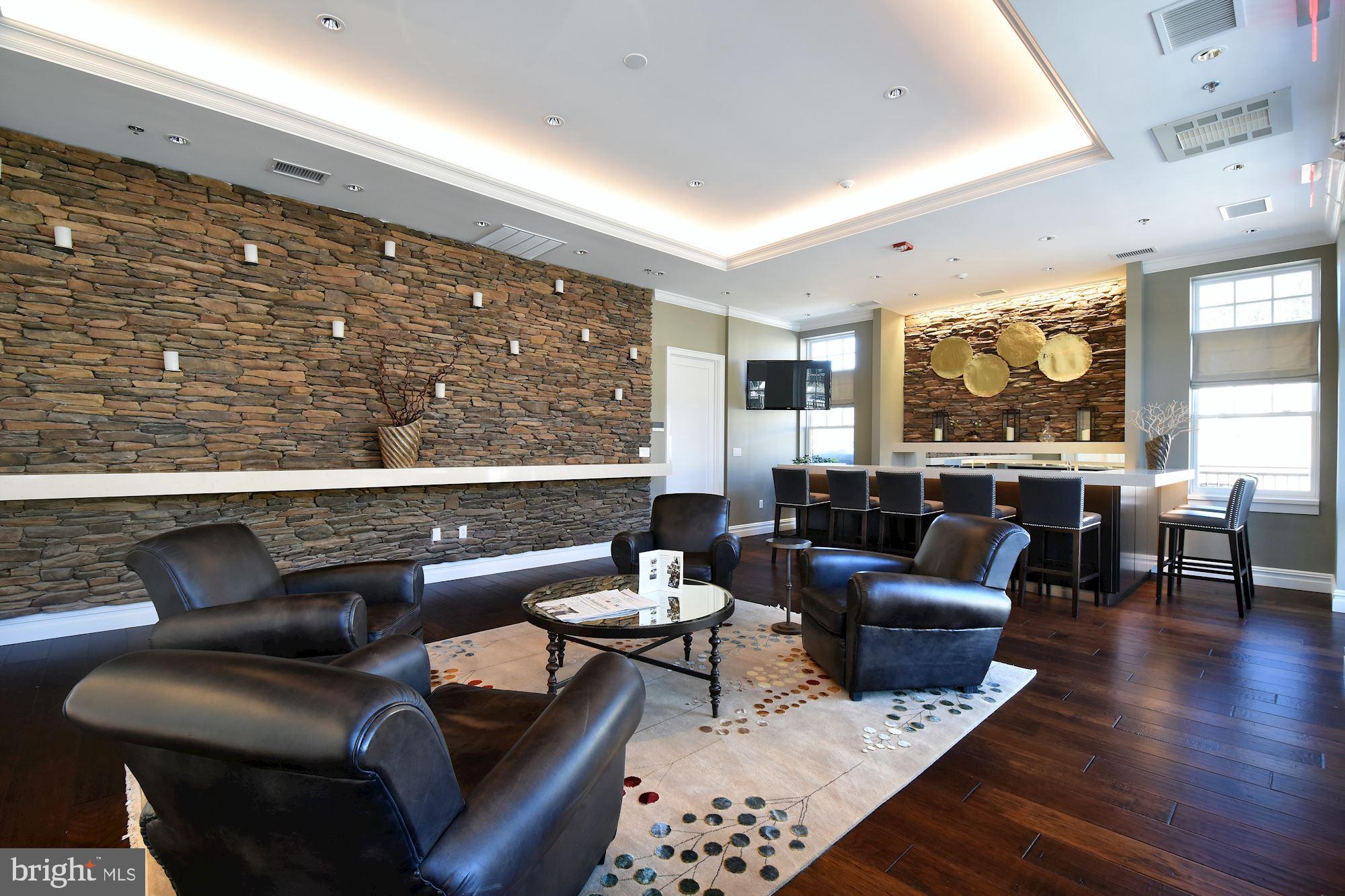 8121 River Road, Unit 451 Bethesda, MD 20817 - Photo 83 of 94 a living room with furniture and a large window