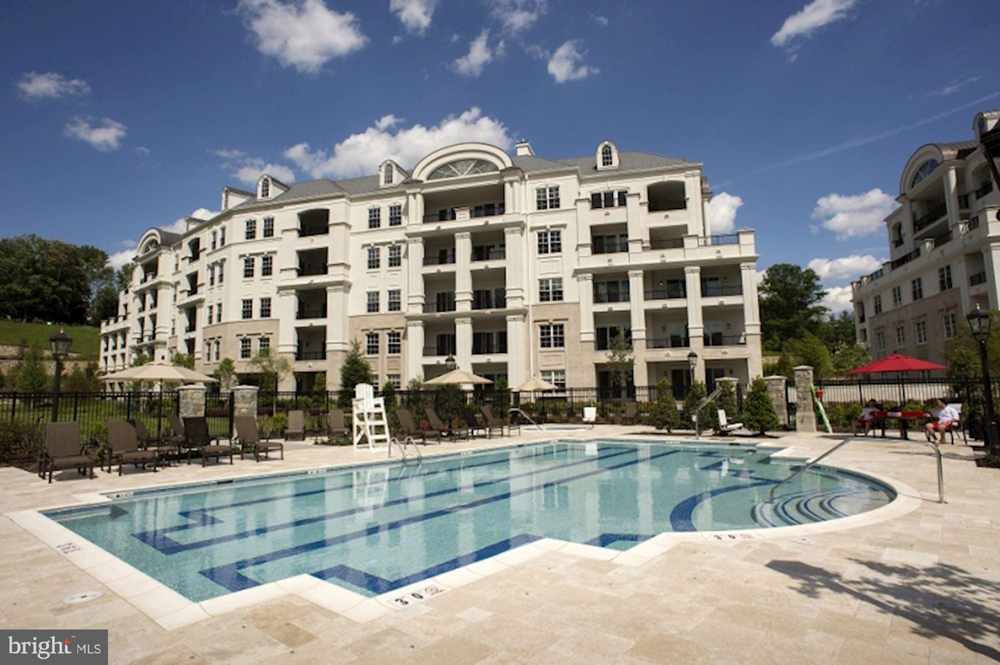 8121 River Road, Unit 451 Bethesda, MD 20817 - Photo 87 of 94 a view of building with swimming pool and outdoor space