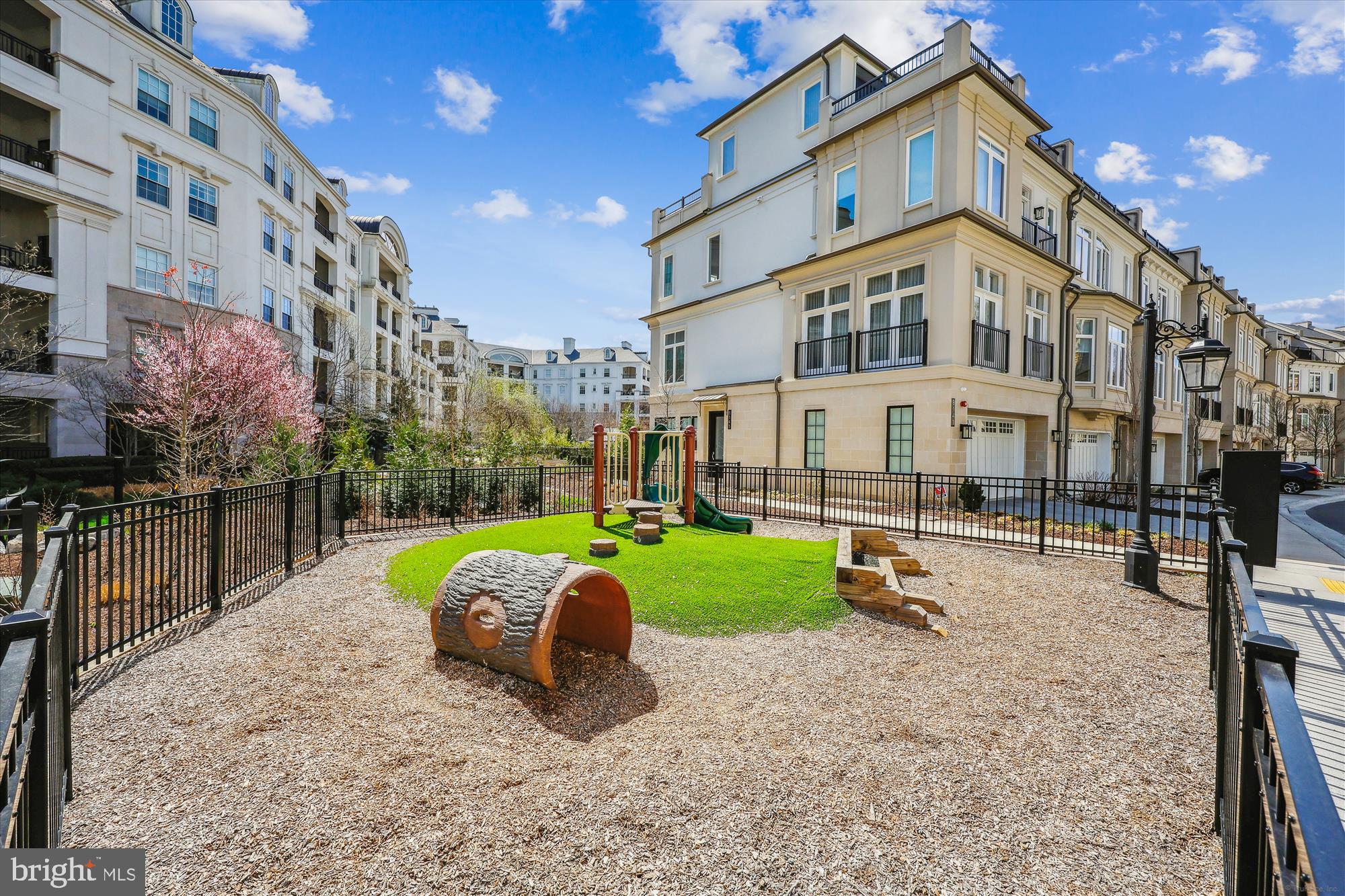 8121 River Road, Unit 451 Bethesda, MD 20817 - Photo 91 of 94 a view of a house with backyard porch and sitting area