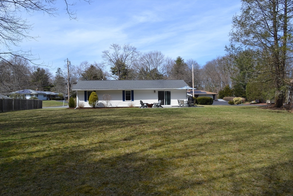 46 Griffin Road Framingham, MA 01701 - Photo 17 of 22 a front view of house with yard having outdoor seating