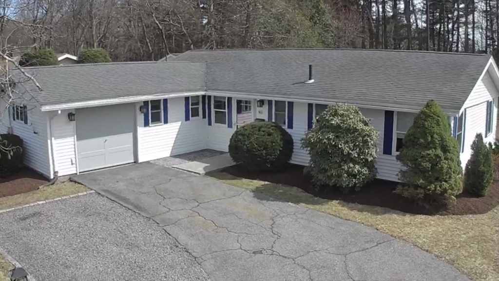 46 Griffin Road Framingham, MA 01701 - Photo 2 of 22 a front view of a house with garden