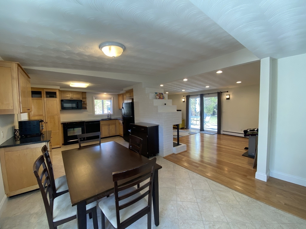 46 Griffin Road Framingham, MA 01701 - Photo 7 of 22 a dining room with furniture and wooden floor