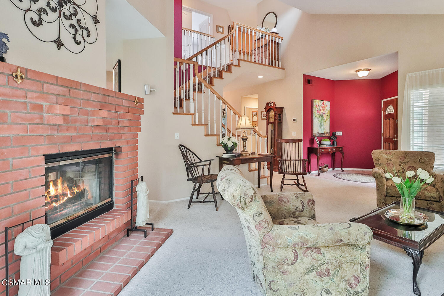 7176 University Drive Moorpark, CA 93021 - Photo 12 of 74 a living room with furniture and a fireplace