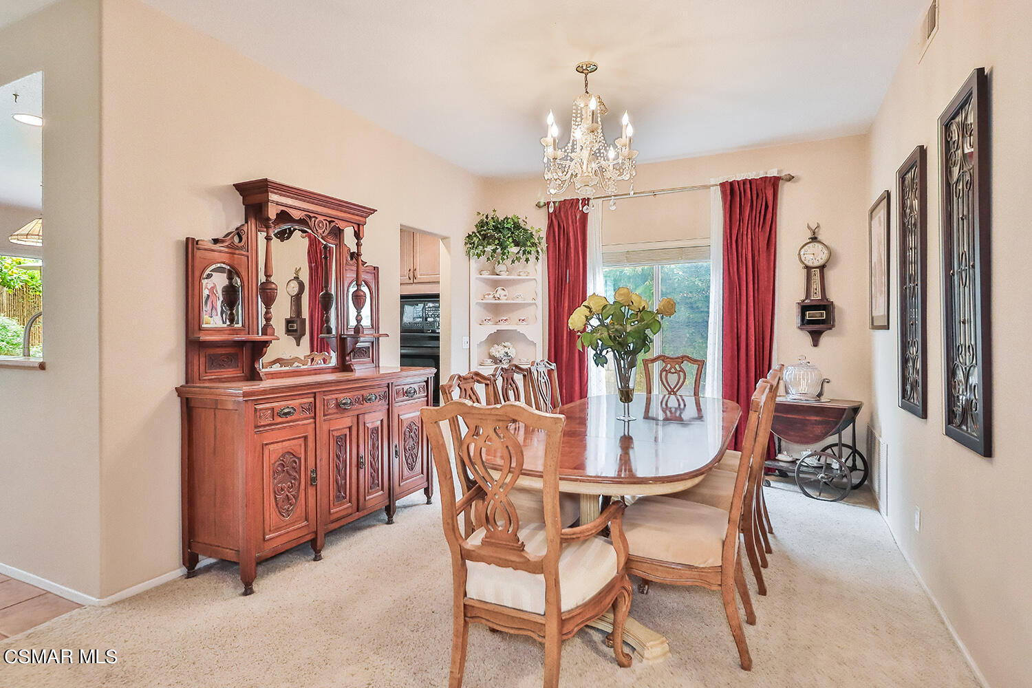 7176 University Drive Moorpark, CA 93021 - Photo 14 of 74 a dining room with furniture a chandelier and window