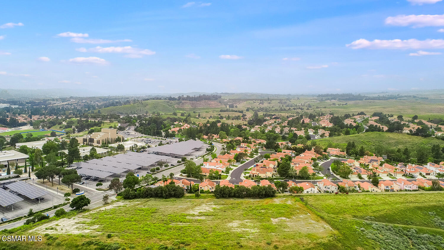 7176 University Drive Moorpark, CA 93021 - Photo 27 of 74 an aerial view of residential houses with outdoor space and trees