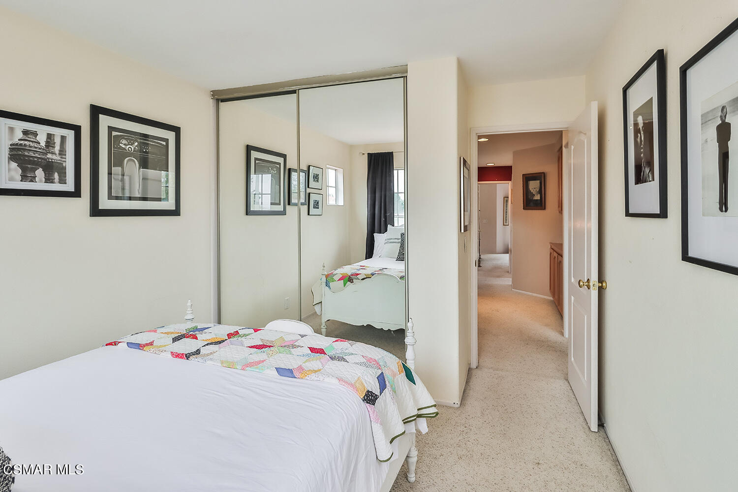 7176 University Drive Moorpark, CA 93021 - Photo 33 of 74 a bedroom that has a bed and a table in it