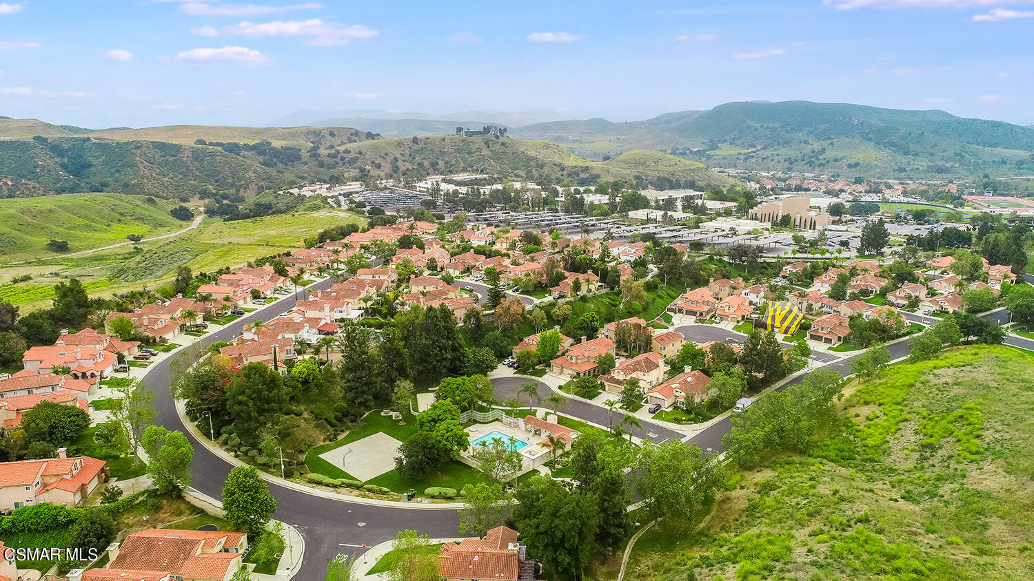 7176 University Drive Moorpark, CA 93021 - Photo 44 of 74 an aerial view of residential houses with outdoor space and trees