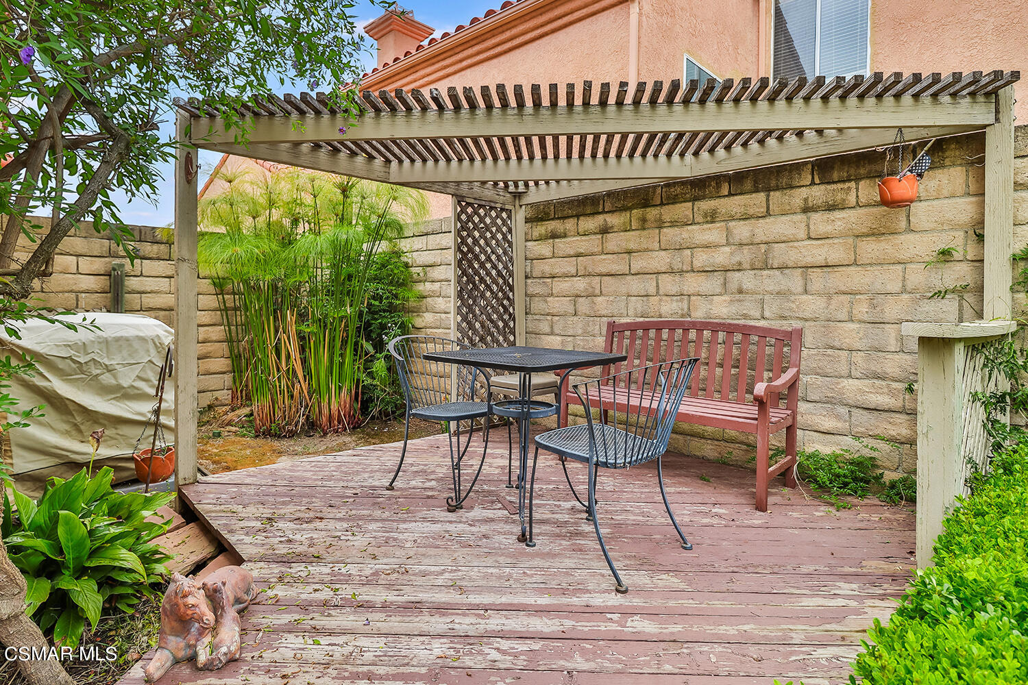 7176 University Drive Moorpark, CA 93021 - Photo 56 of 74 a patio with table and chairs