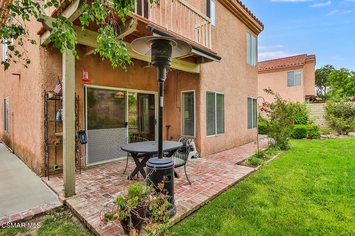 7176 University Drive Moorpark, CA 93021 - Photo 64 of 74 a view of a house with backyard porch and sitting area
