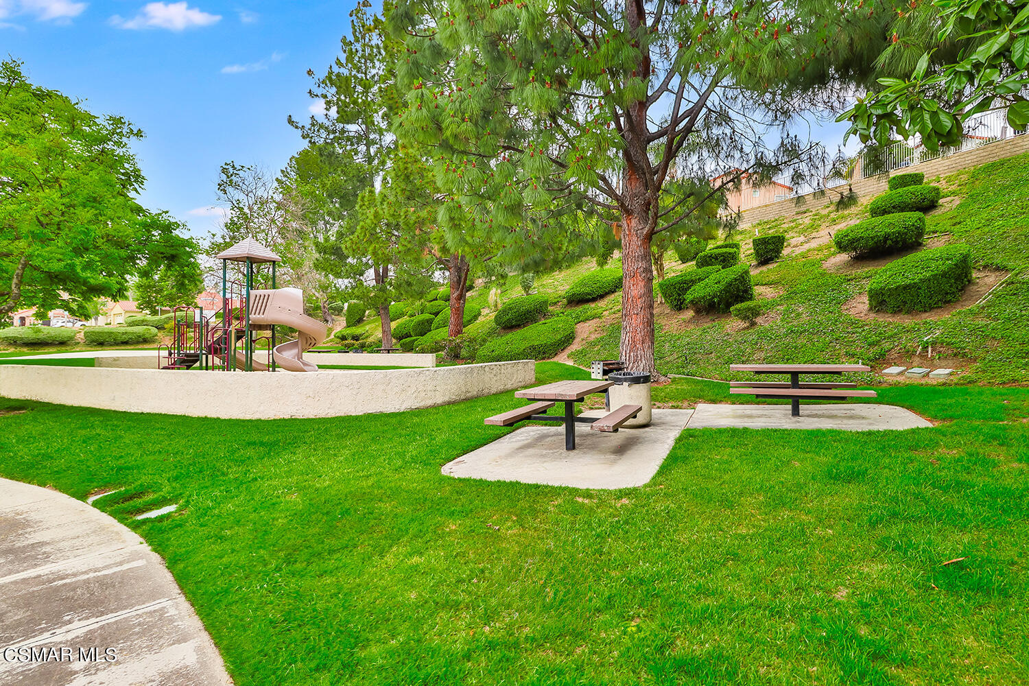 7176 University Drive Moorpark, CA 93021 - Photo 68 of 74 a view of a house with backyard and sitting area