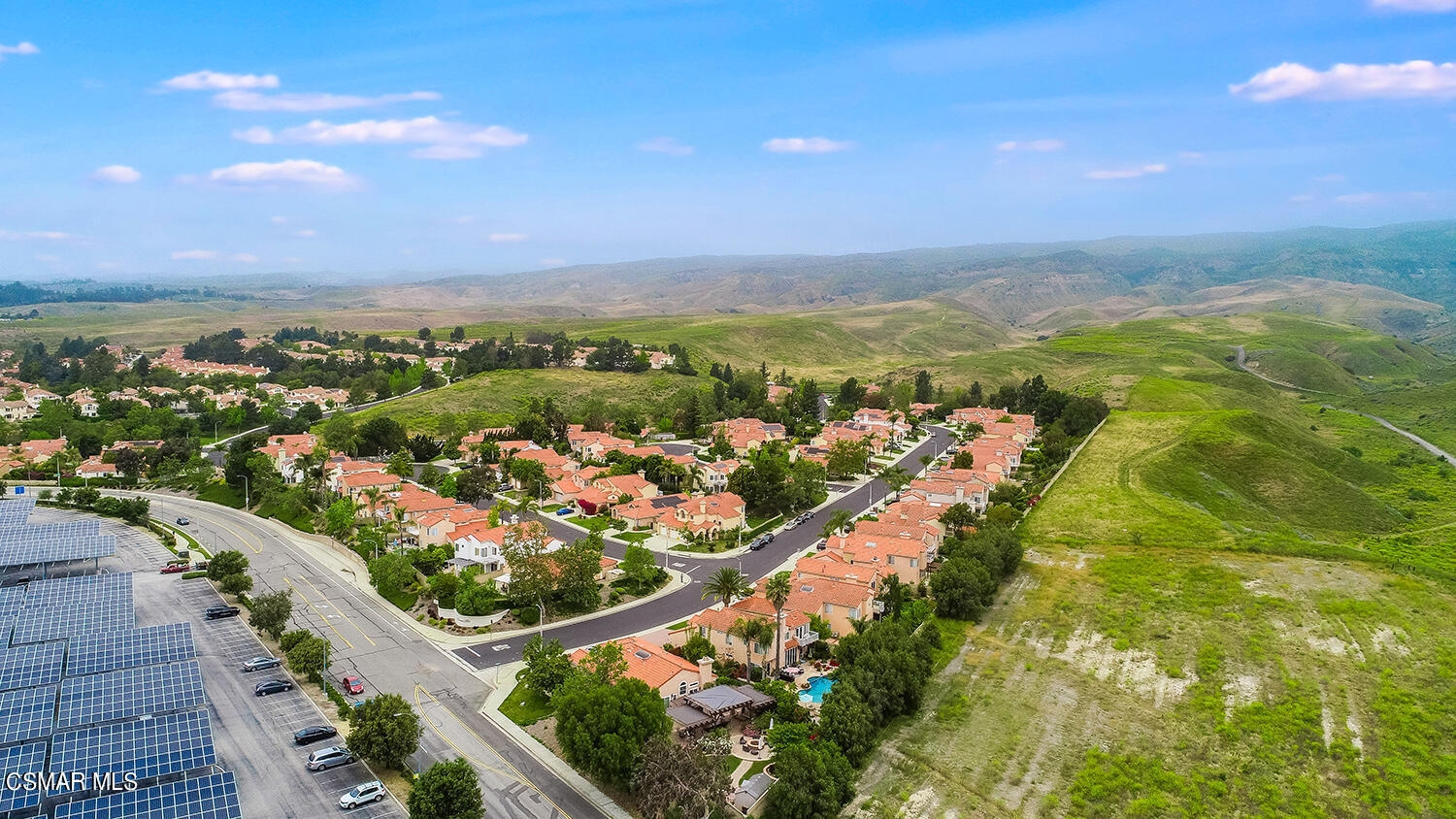 7176 University Drive Moorpark, CA 93021 - Photo 7 of 74 an aerial view of lake and residential houses with outdoor space