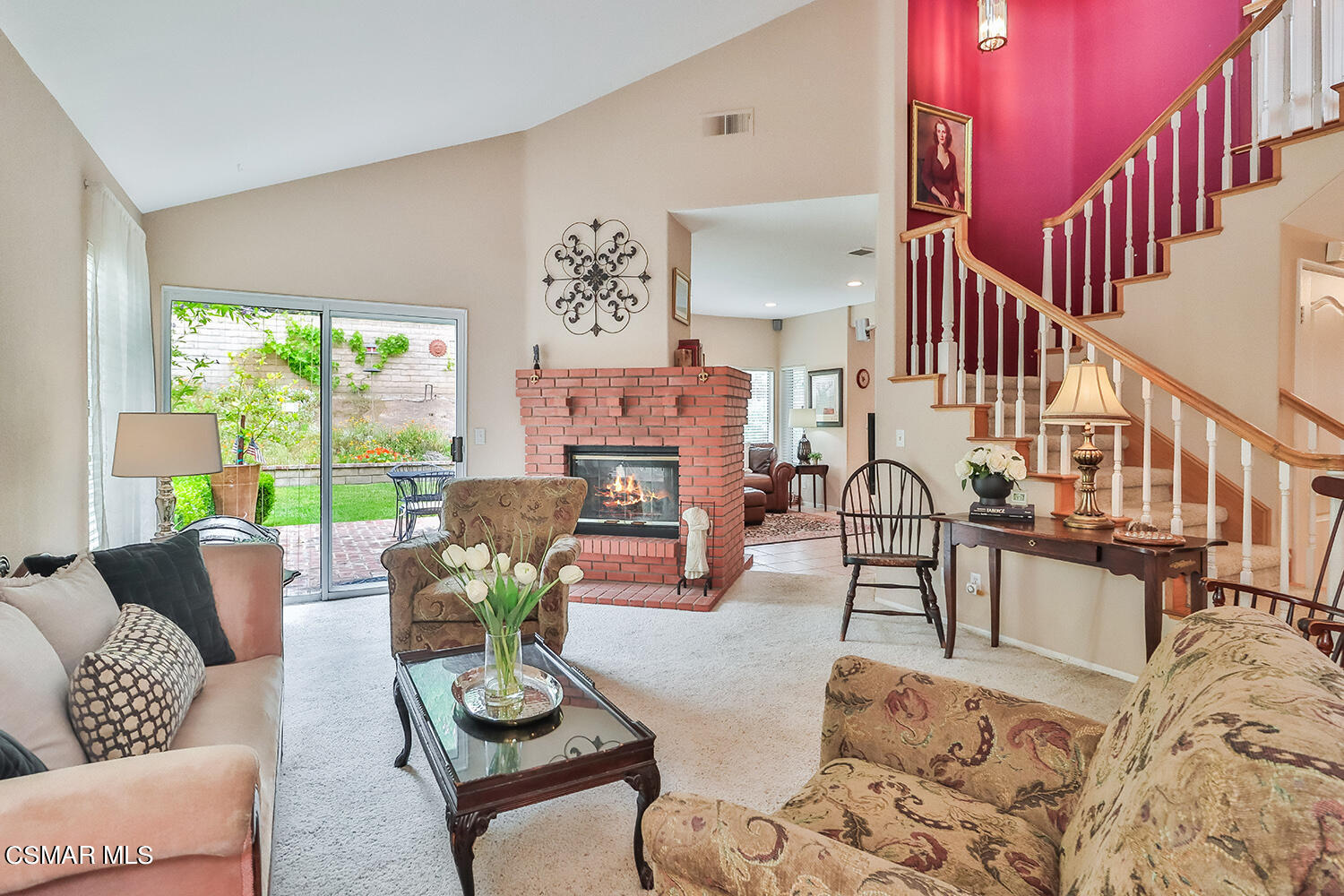 7176 University Drive Moorpark, CA 93021 - Photo 10 of 74 a living room with furniture fireplace and a large window