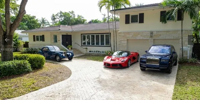 a picture of a book and a white bed