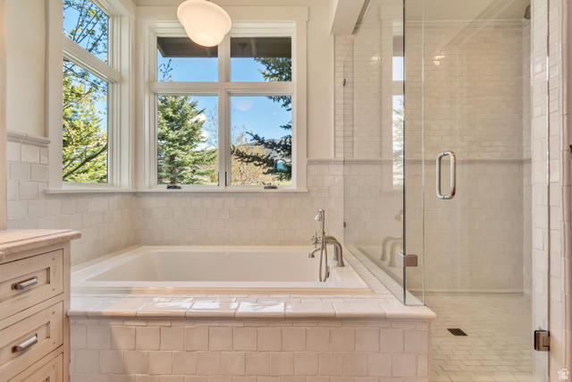 2579 Splendor Valley Road Kamas, UT 84036 - Photo 50 of 87 Full bath with a garden tub, a shower stall, and vanity