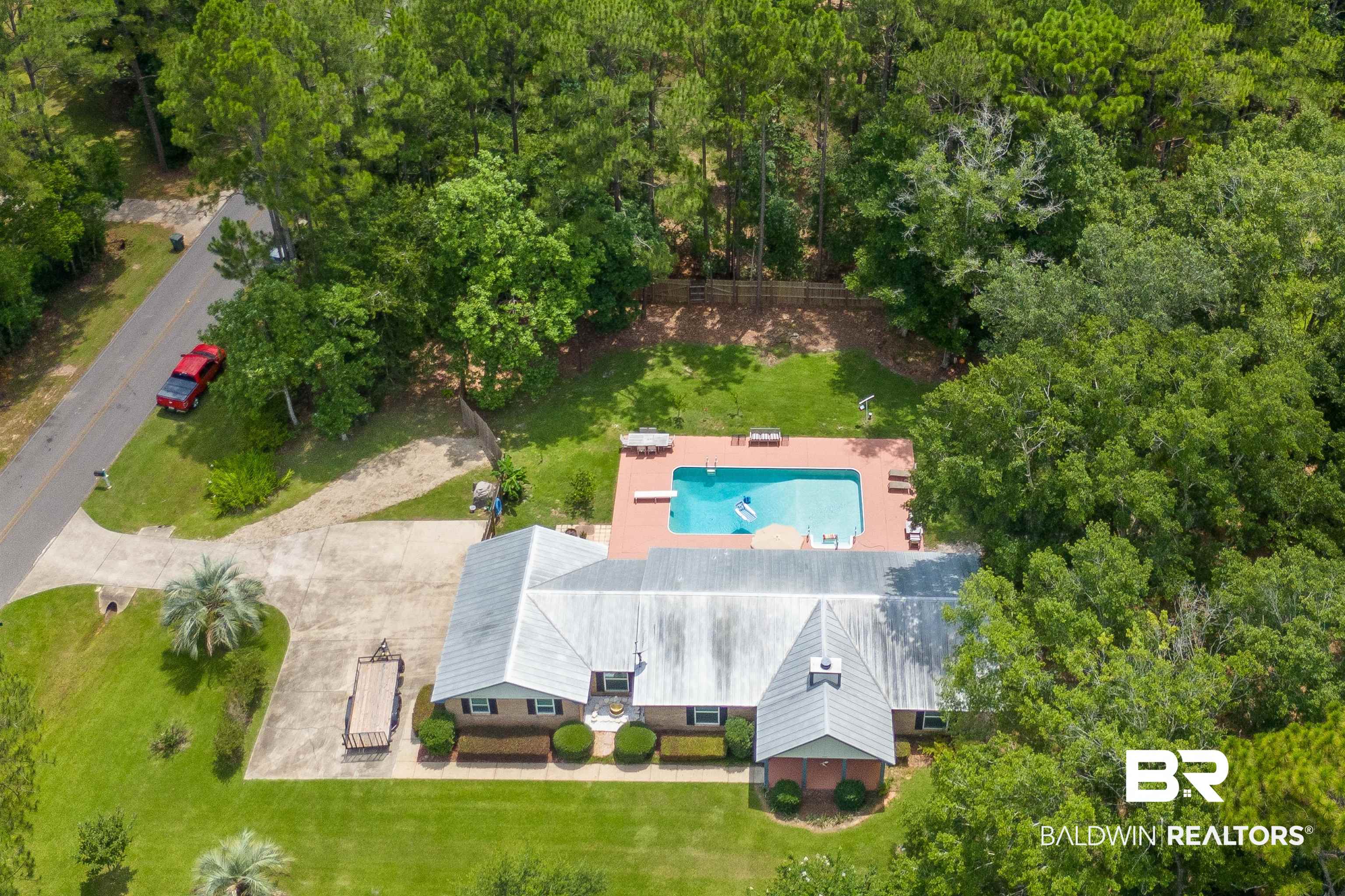 24551 Wolf Bay Drive Foley, AL 36535 - Photo 51 of 59 Aerial view of property and surrounding area with a pool