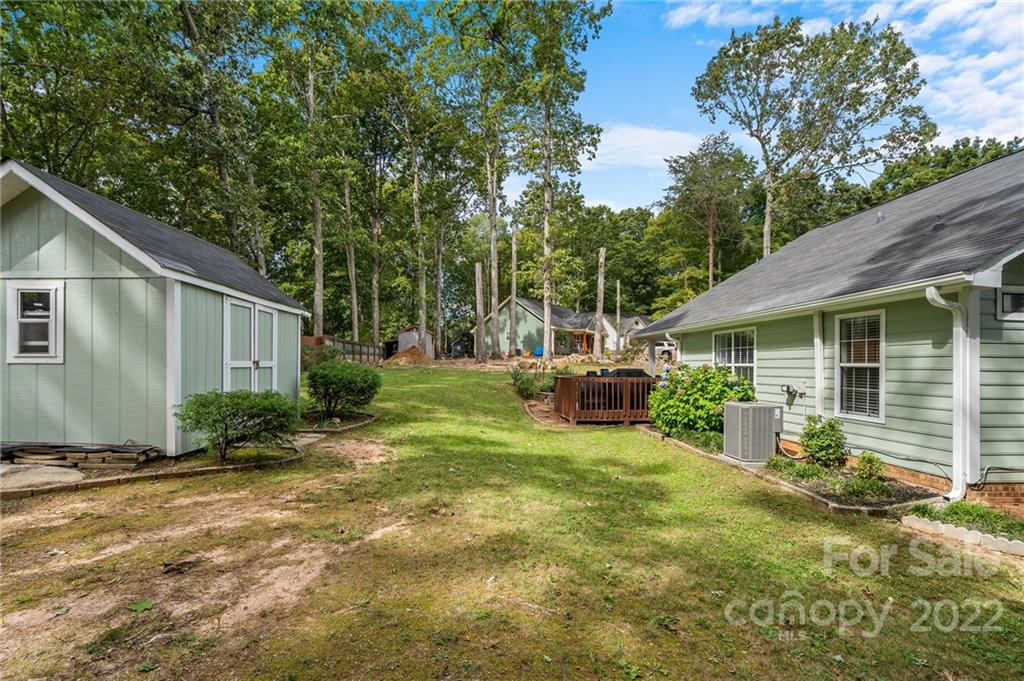7192 Brookridge Drive Denver, NC 28037 - Photo 26 of 30 a view of a house with backyard