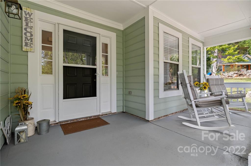 7192 Brookridge Drive Denver, NC 28037 - Photo 4 of 30 a living room with furniture a window and gym equipment