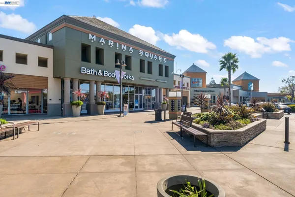 a front view of a building with pots