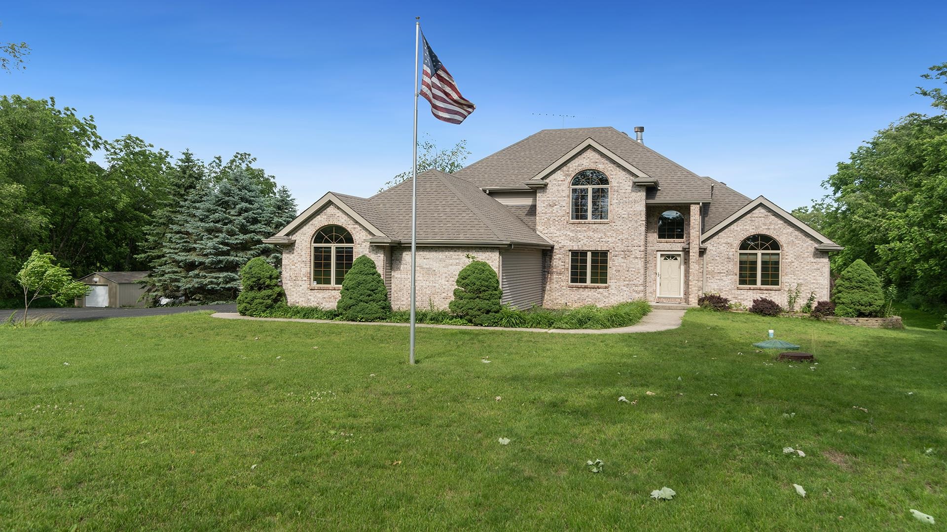 16405 Cannell Road Rockton, IL 61072 - Photo 1 of 53 a view of a house with a yard