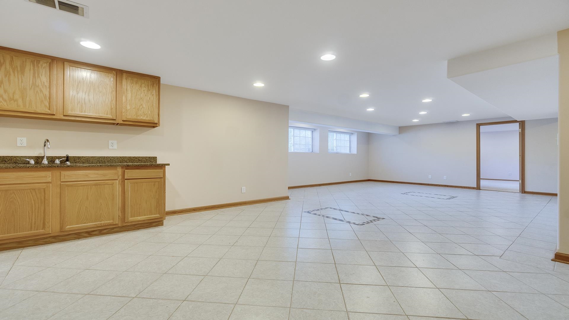 16405 Cannell Road Rockton, IL 61072 - Photo 37 of 53 a view of a kitchen with stainless steel appliances a stove a sink a microwave and cabinets