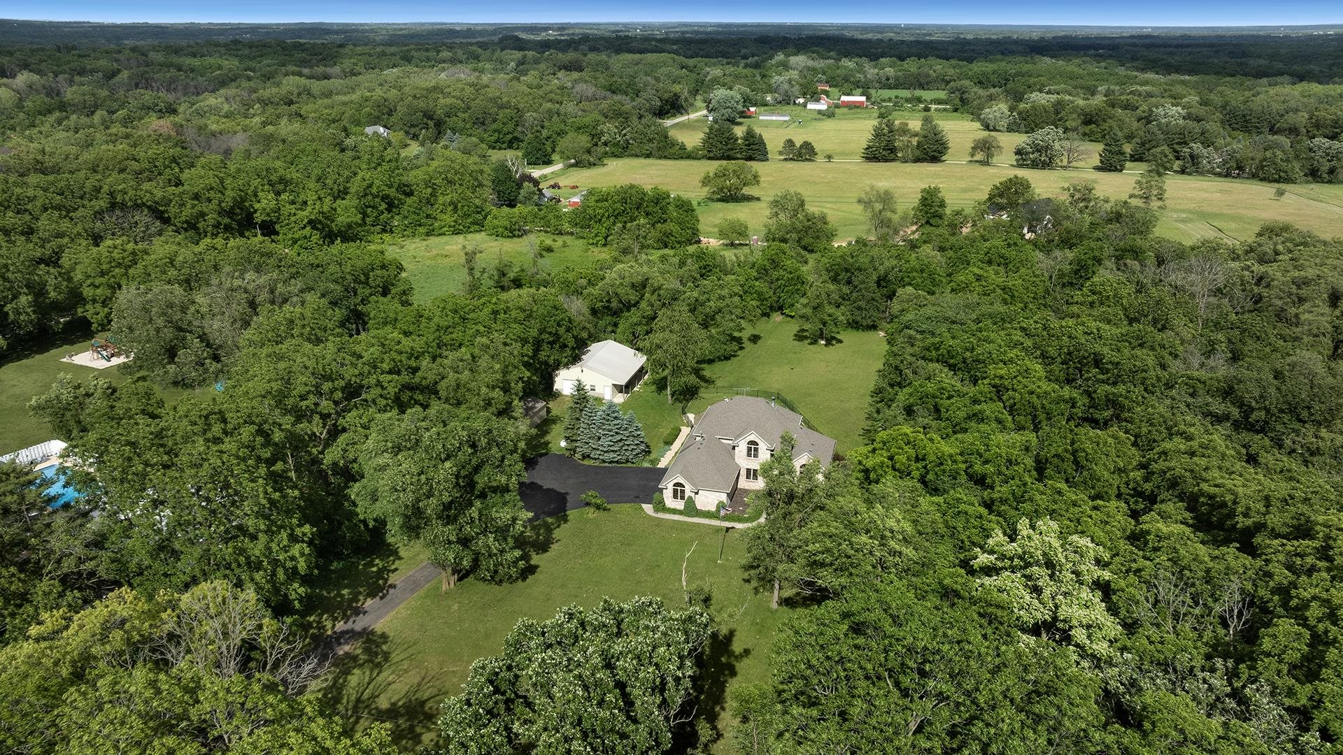 16405 Cannell Road Rockton, IL 61072 - Photo 7 of 53 an aerial view of a house with a yard