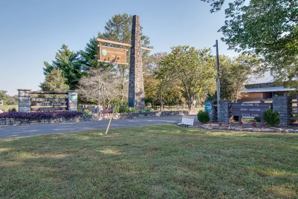a view of parking with sign on the wall
