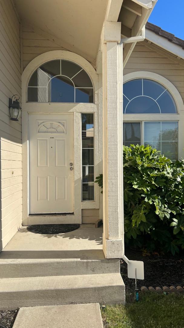 4259 Merced Circle Antioch, CA 94531 - Photo 2 of 21 a view of a brick house with a small yard