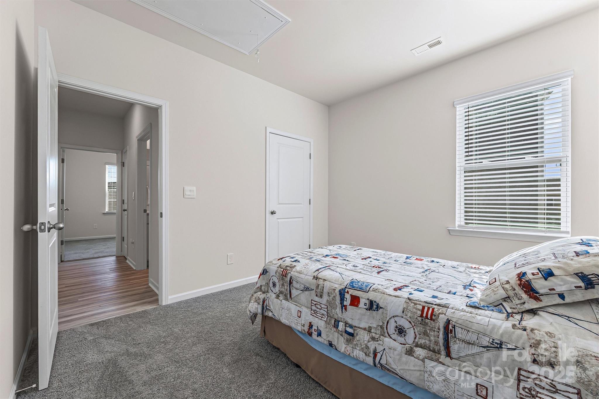 1219 Rutherford Street York, SC 29745 - Photo 23 of 38 a bedroom with a bed and a window