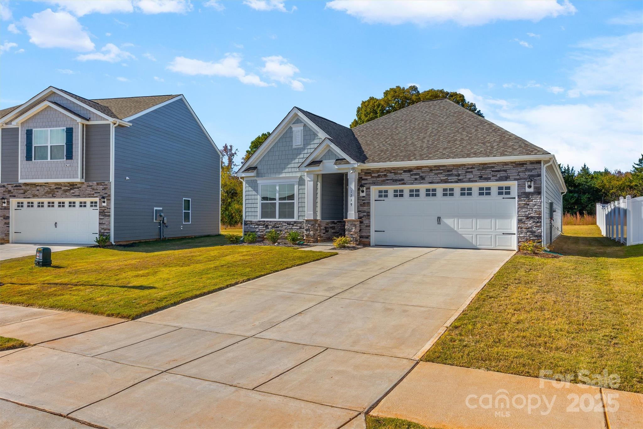 1219 Rutherford Street York, SC 29745 - Photo 28 of 38 a front view of a house with a yard