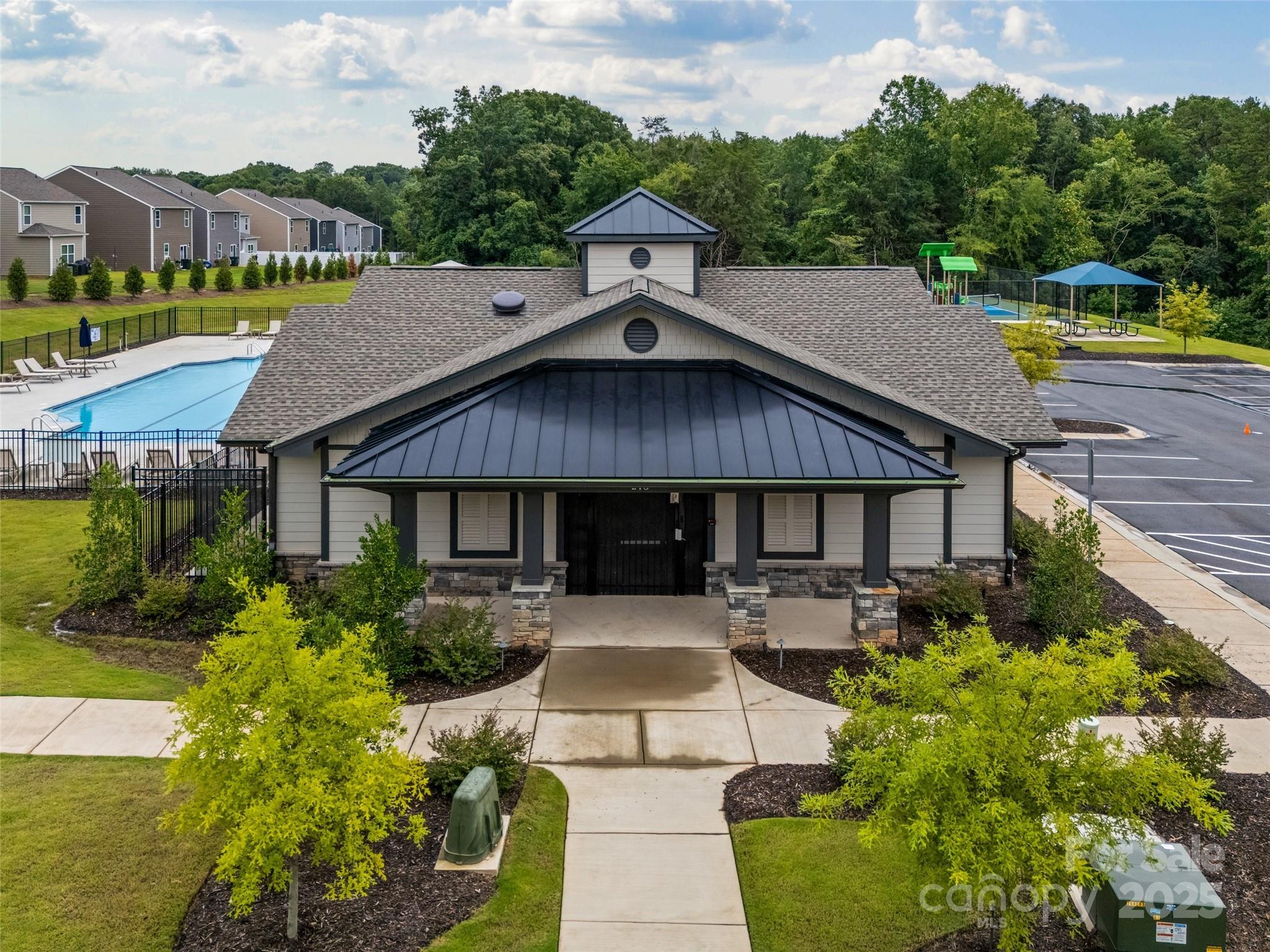 1219 Rutherford Street York, SC 29745 - Photo 30 of 38 a aerial view of a house with swimming pool and a chairs