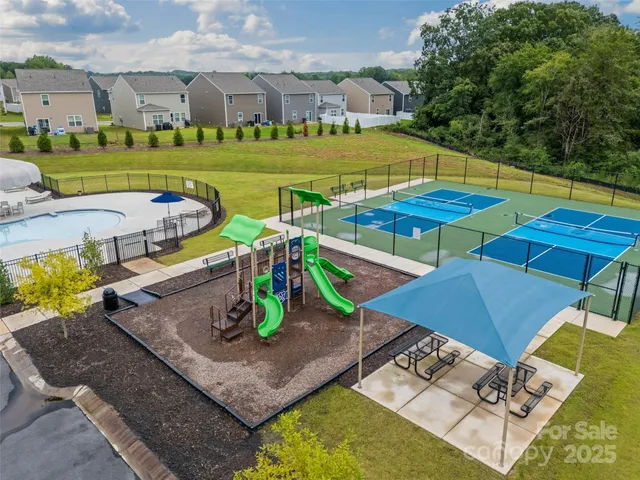 a view of an ocean with seating area