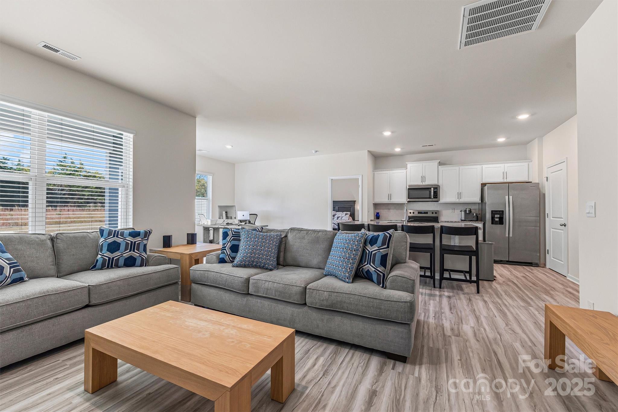 1219 Rutherford Street York, SC 29745 - Photo 8 of 38 a living room with furniture and kitchen view