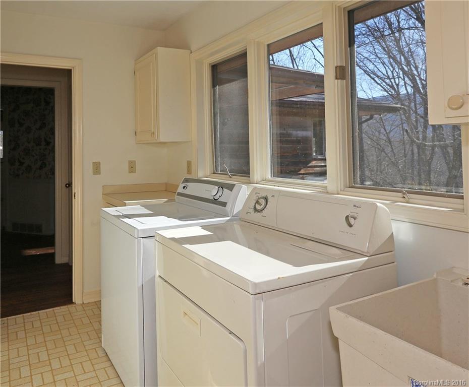 435 Clemson Road Waynesville, NC 28786 - Photo 14 of 21 a utility room with dryer and washer