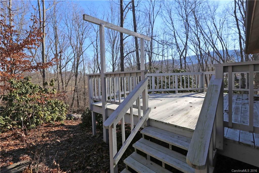 435 Clemson Road Waynesville, NC 28786 - Photo 20 of 21 a view of balcony with wooden floor and fence