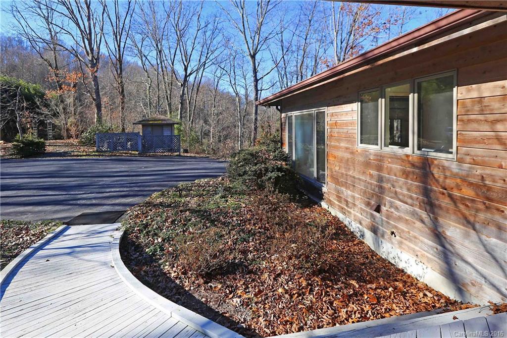 435 Clemson Road Waynesville, NC 28786 - Photo 3 of 21 a view of a couches on the roof deck